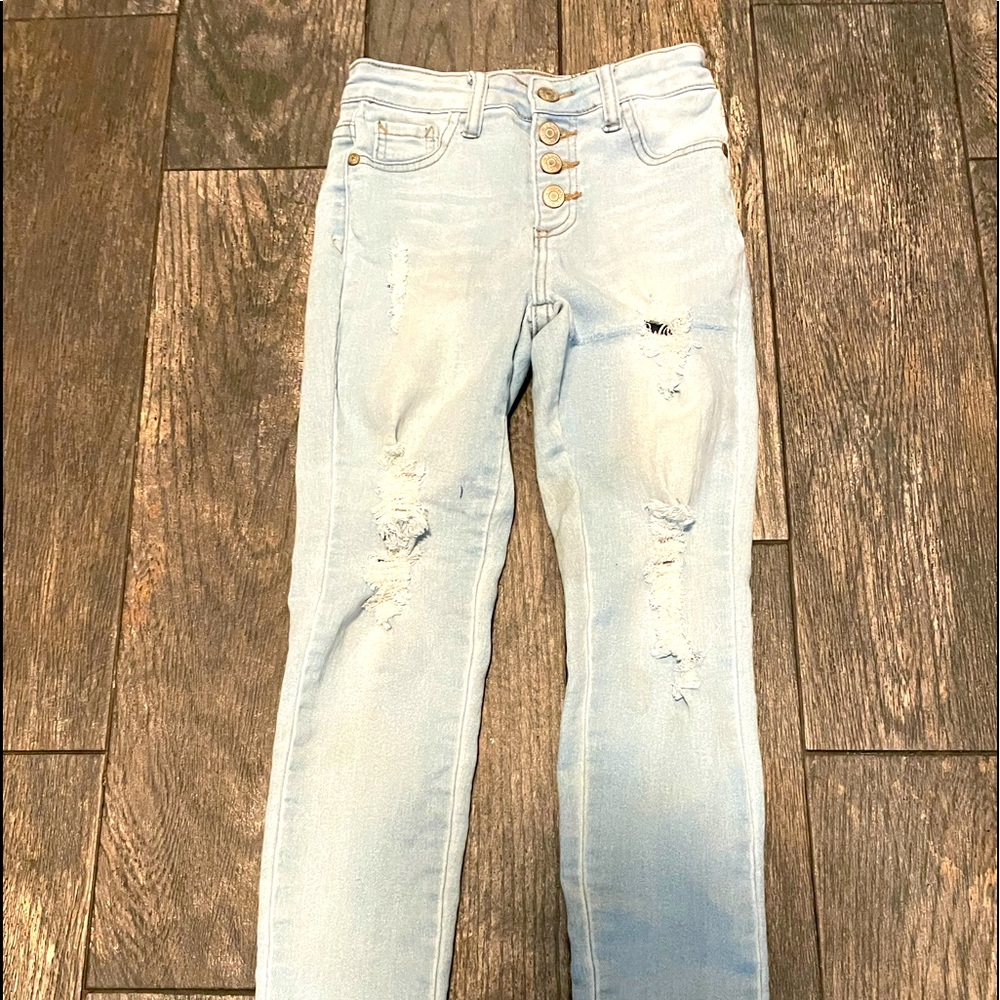 Button fly ripped jeans